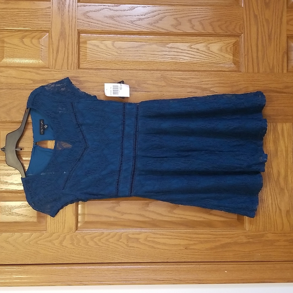 City Triangles teal lace dress. NWT medium